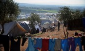 At least 28 dead in air raids on Syria displaced camp near Turkey: monitor