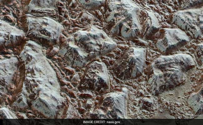 NASA probe beams best close-up images of Pluto