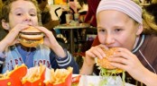 Beware! Burgers, chips at lunch may cause food comas